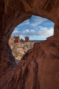 Cove Arch frmaing Double Arch in Arches National Park